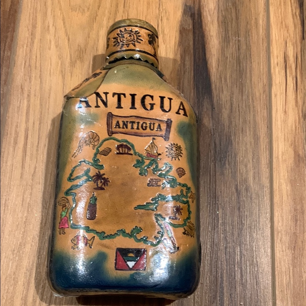 Tooled leather covered glass flask from Antiqua 7” unused